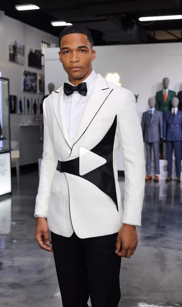 White tuxedo with black accents worn in a modern showroom with mannequins